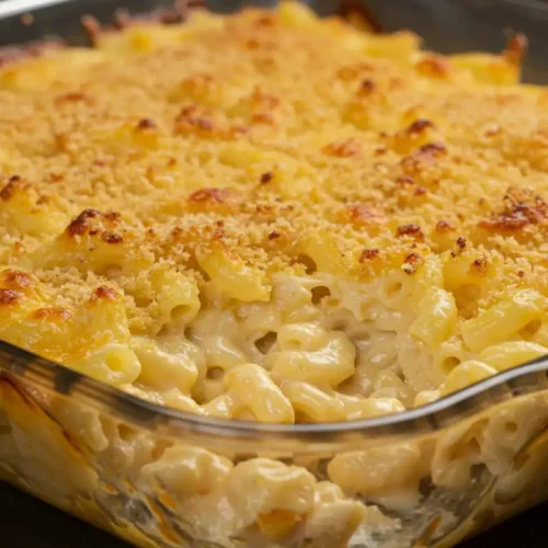 Baked Tini's mac and cheese with a golden brown and bubbly topping, showcasing the delicious result of "tinis mac and cheese recipe