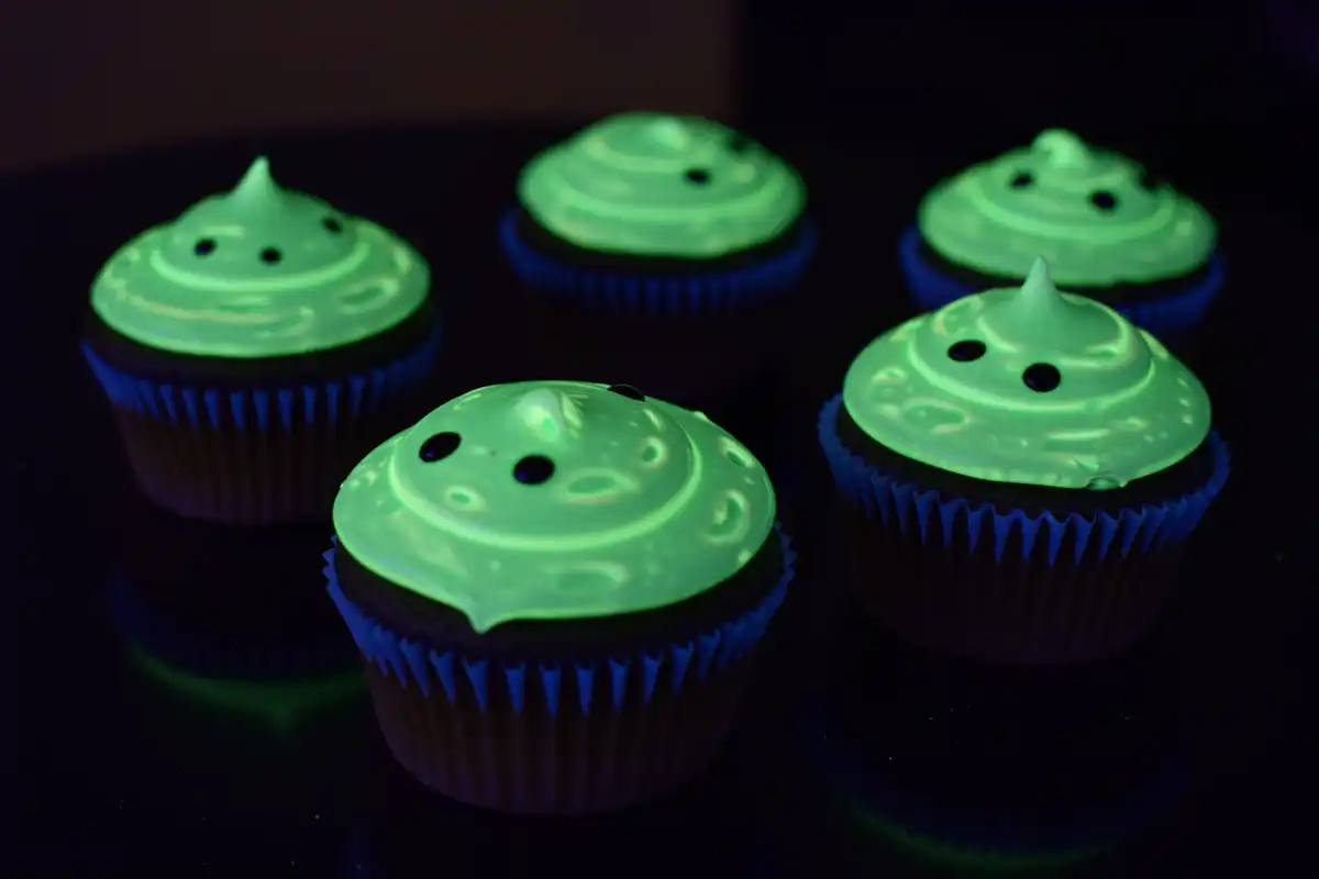 Glow-in-the-Dark Moonlit Cupcakes glow vibrantly under black light.